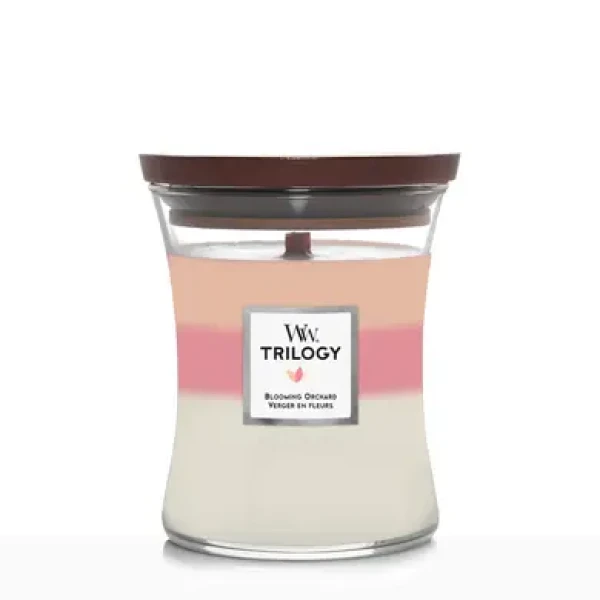 Ароматическая свеча с нежными нотами Woodwick Trilogy Blooming Orchard